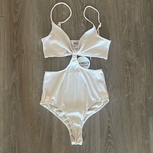 White fox cut our body suit. Australian size 8. US size 4.